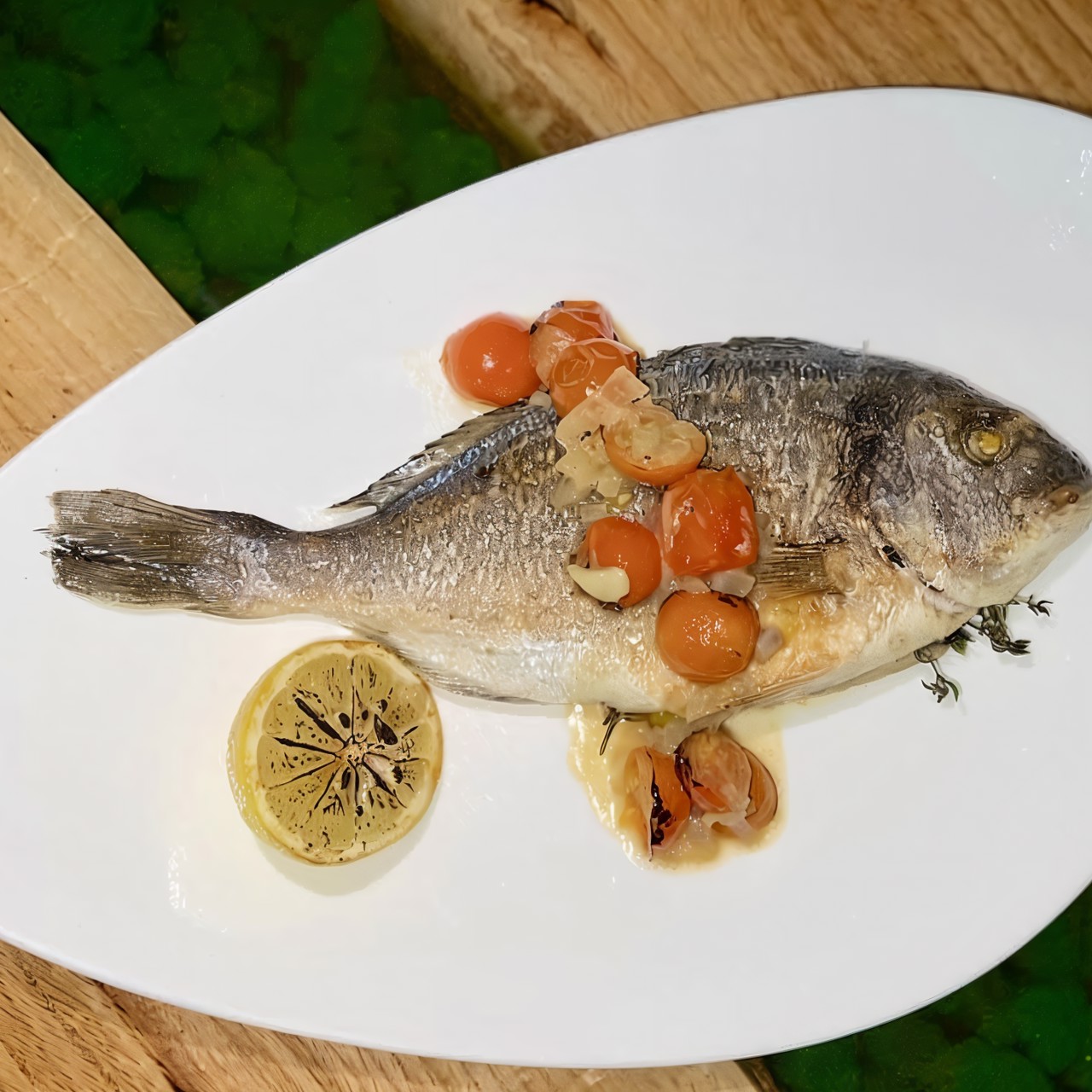 Дорада на гриле с травами