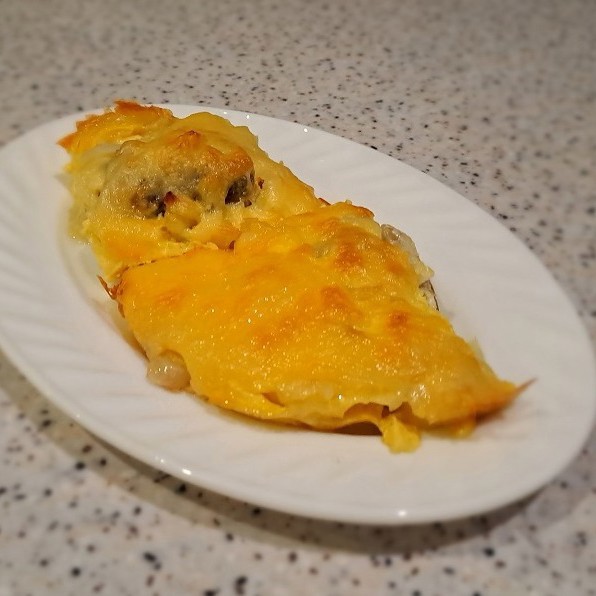 Хек со сметаной и сыром в духовке