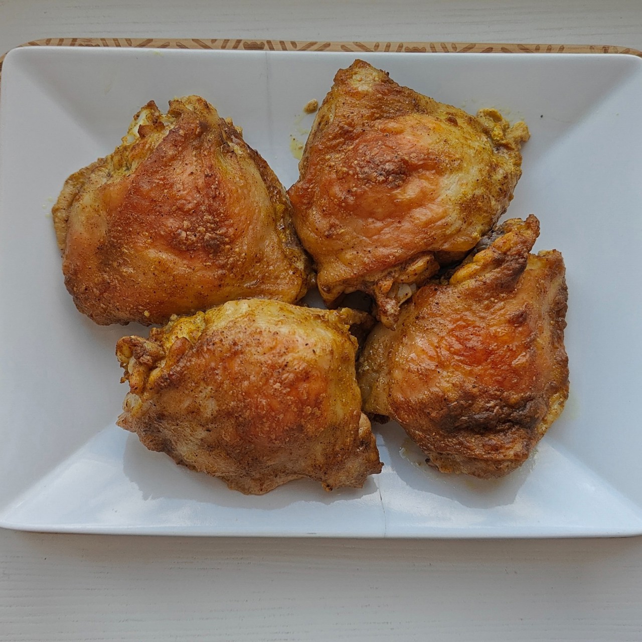 Куриные бедра с куркумой в духовке