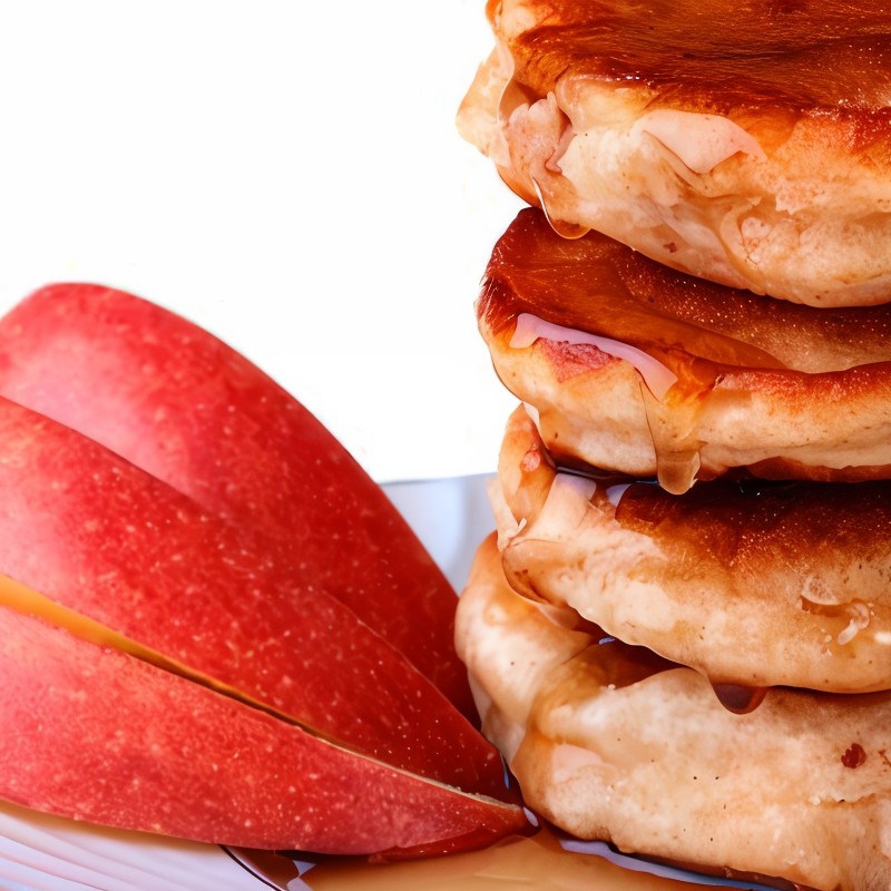 Оладьи манные с яблоками и изюмом