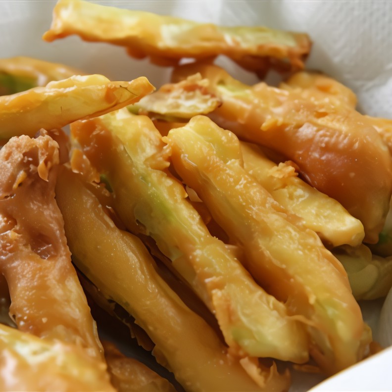 Палочки из цукини в золотистой панировке из пармезана