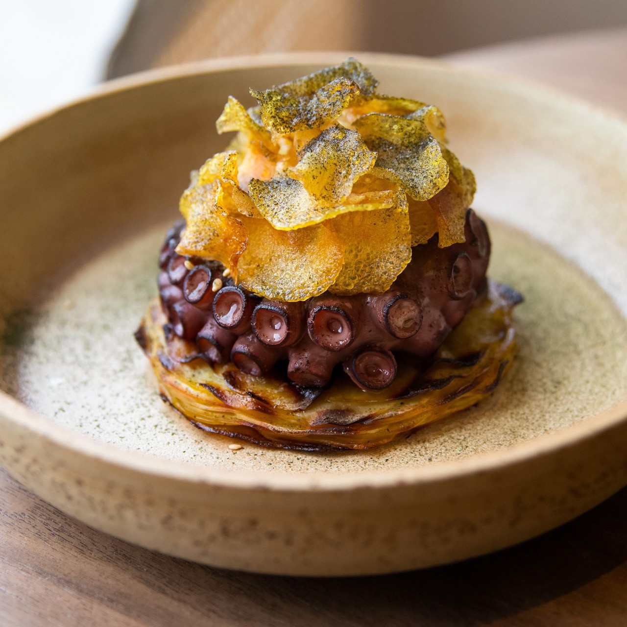 Пряный осьминог с картофельным гратеном