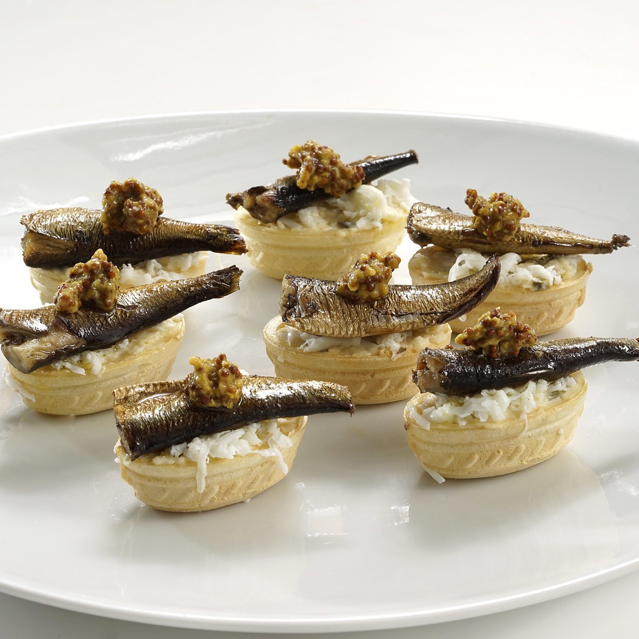 Тарталетки со шпротами