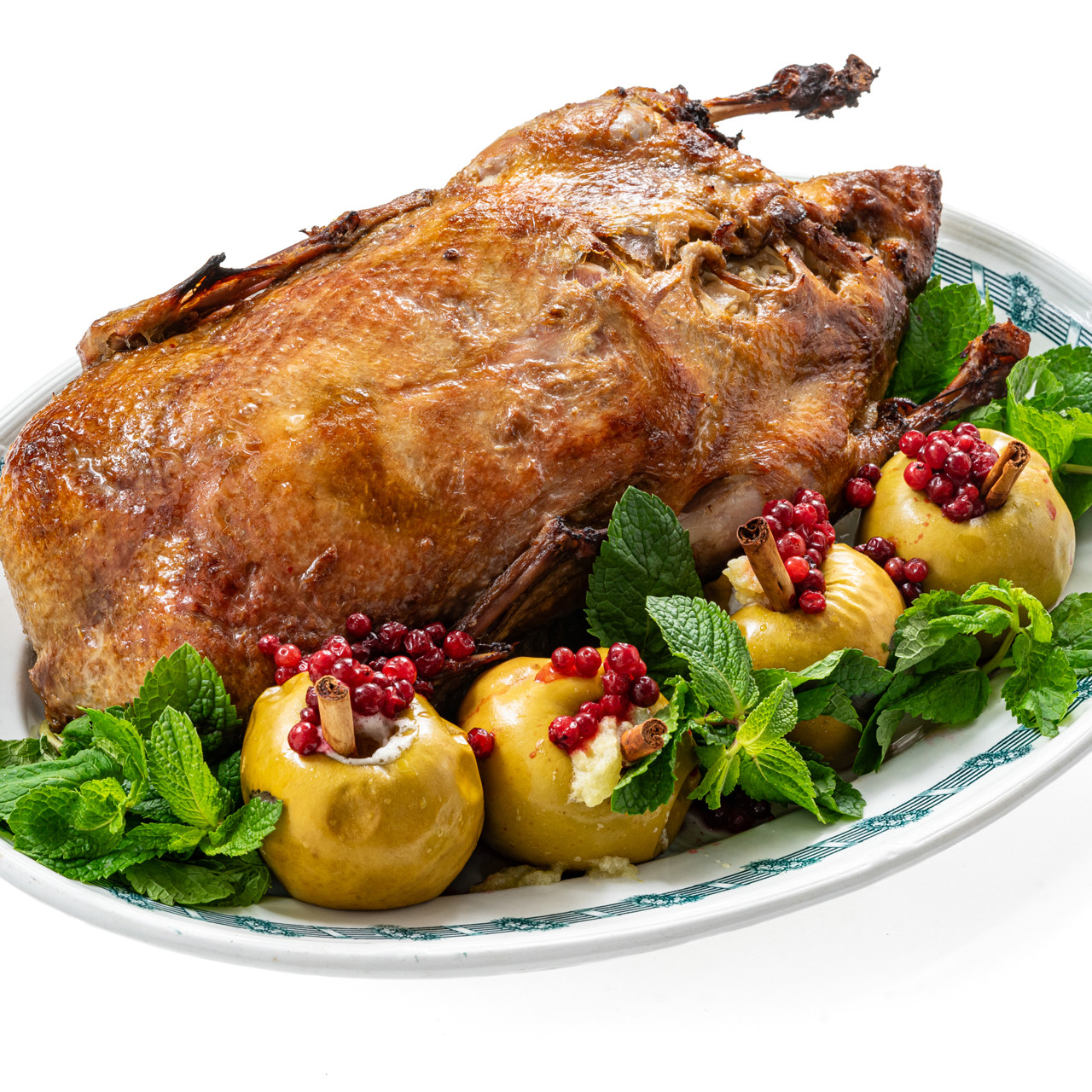 Утка в духовке с яблоками и квашеной капустой