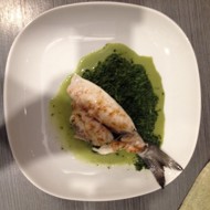 Дорада, припущенная в вине, на подушке из шпината со сливками