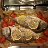 Дорада с травами в бумажном конверте