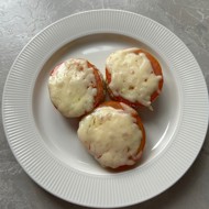 Кабачки в духовке с помидорами и сыром