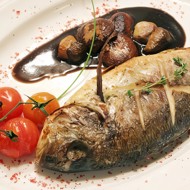 Карп, фаршированный овощами