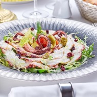 Карпаччо из осьминога с поке из авокадо и томатов