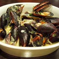 Мидии в сырном соусе