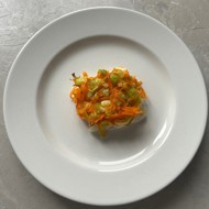 Минтай под овощной шапкой в духовке