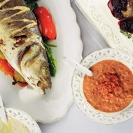 Сибас с мухурмой из грецких и таратором из кедровых орехов