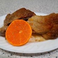 Утка с мандаринами в рукаве