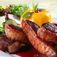 Утка, тушеная в томатном соусе