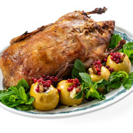 Утка в духовке с яблоками и квашеной капустой