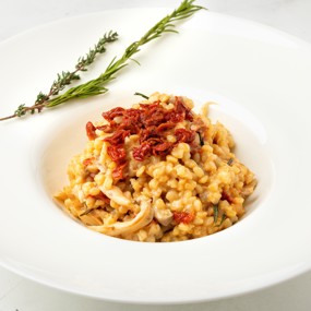 Армянское ризотто из дзавара с вешенками и вялеными томатами