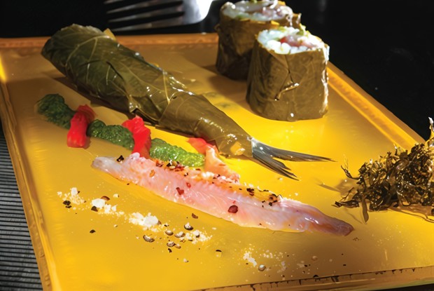 Маринованные сардины с виноградными листьями