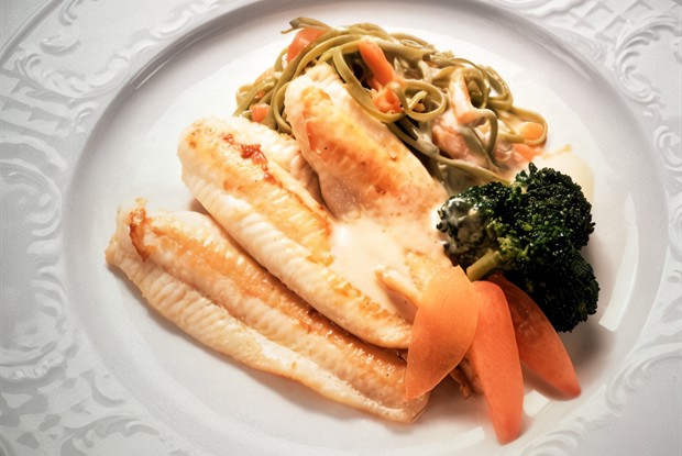 Рыбное филе, тушенное с картофелем по-русски