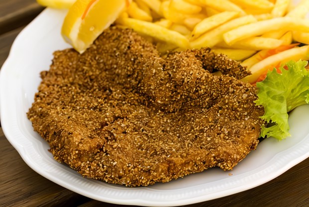 Телячьи отбивные под корочкой из базилика и пармезана