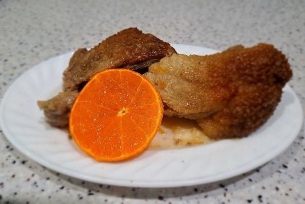 Утка с мандаринами в рукаве