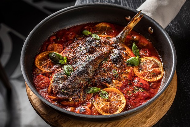 Запеченный сибас с соусами бамбука, харисса и чимичурри