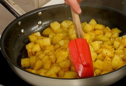 Фото шага рецепта Жареная картошка бататахарра 114372 шаг 7  