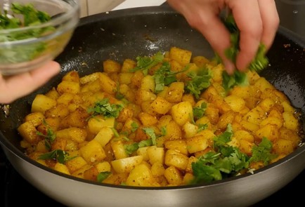 Фото шага рецепта Жареная картошка бататахарра 114372 шаг 8  