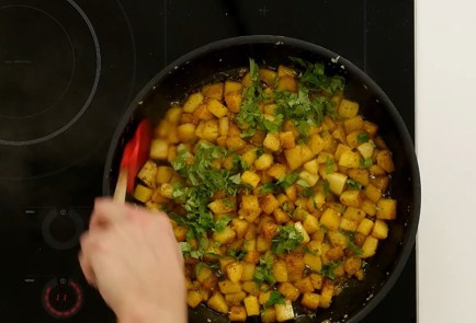 Фото шага рецепта Жареная картошка бататахарра 114372 шаг 9  