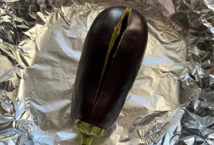 Фото шага рецепта Битые баклажаны с сыром и помидором 174529 шаг 9  