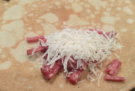 Фото шага рецепта Блинчики с сыром и колбасой 190892 шаг 10  