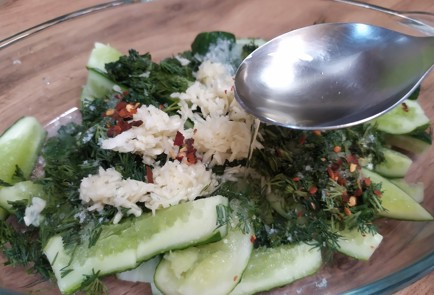 Фото шага рецепта Быстрая закуска из огурцов 189161 шаг 9  