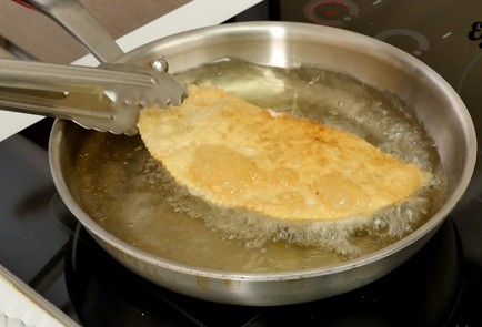 Фото шага рецепта Чебуреки 126530 шаг 9