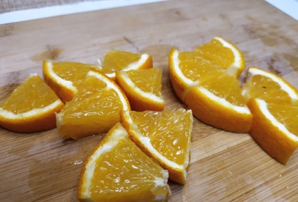 Фото шага рецепта Домашний чай с апельсином и клюквой 190759 шаг 3  