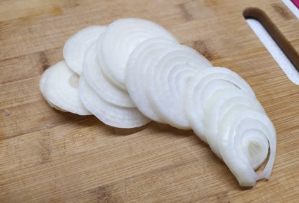 Фото шага рецепта Филе минтая под сыром 189332 шаг 2  