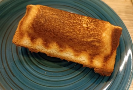 Фото шага рецепта Горячий бутерброд с сосиской 191096 шаг 10  