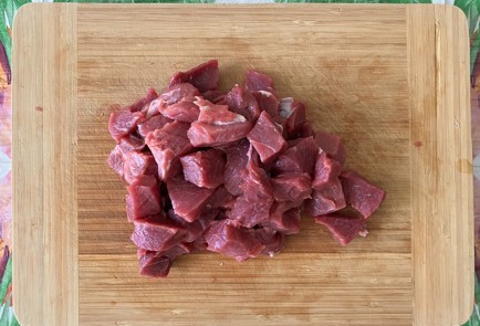 Фото шага рецепта Говядина с черносливом на овощной подушке в духовке 173636 шаг 7  