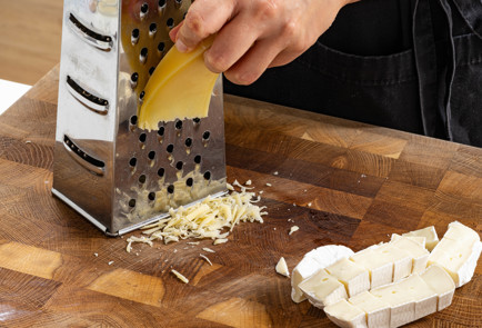 Фото шага рецепта Гратен из кабачков с сыром 189529 шаг 4  