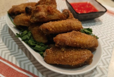 Фото шага рецепта Хрустящие куриные крылышки 175452 шаг 15  