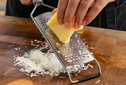 Фото шага рецепта Кабачки в духовке с помидорами 189528 шаг 4  