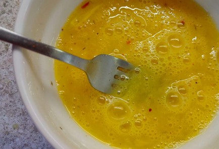 Фото шага рецепта Кальмары фаршированные рисом с яйцом 190229 шаг 10  