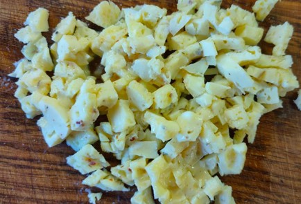 Фото шага рецепта Кальмары фаршированные рисом с яйцом 190229 шаг 12  