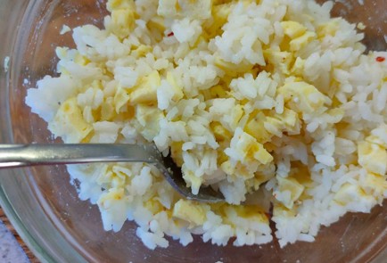 Фото шага рецепта Кальмары фаршированные рисом с яйцом 190229 шаг 14  