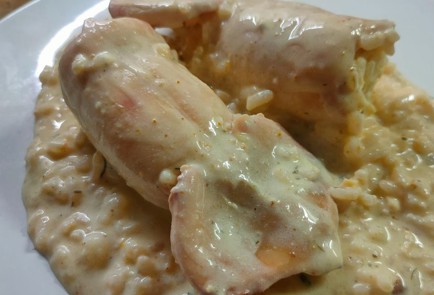 Фото шага рецепта Кальмары фаршированные рисом с яйцом 190229 шаг 22  