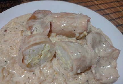 Фото шага рецепта Кальмары фаршированные рисом с яйцом 190229 шаг 23  