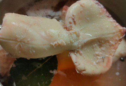 Фото шага рецепта Кальмары фаршированные рисом с яйцом 190229 шаг 8  