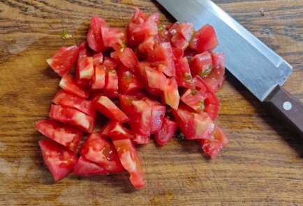 Фото шага рецепта Капуста тушенная с помидором перцем и молодым горошком 174281 шаг 6  