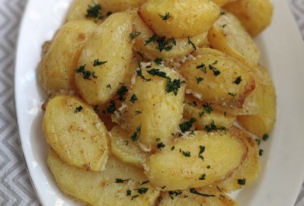 Фото шага рецепта Картофель с чесноком в духовке 173506 шаг 12  