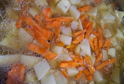 Фото шага рецепта Картофель со свининой 190404 шаг 10