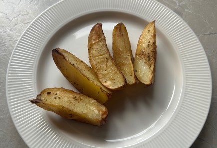 Фото шага рецепта Картофельные дольки в духовке 190010 шаг 10  