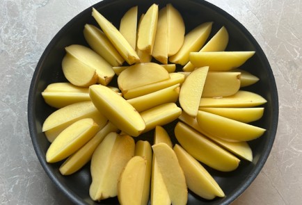 Фото шага рецепта Картофельные дольки в духовке 190010 шаг 4  